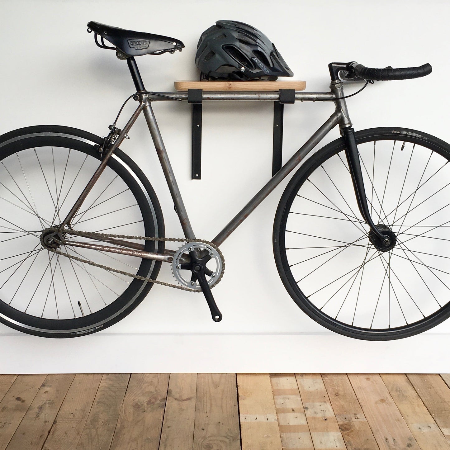 cycle wall hanger | black minimalist + oak shelf