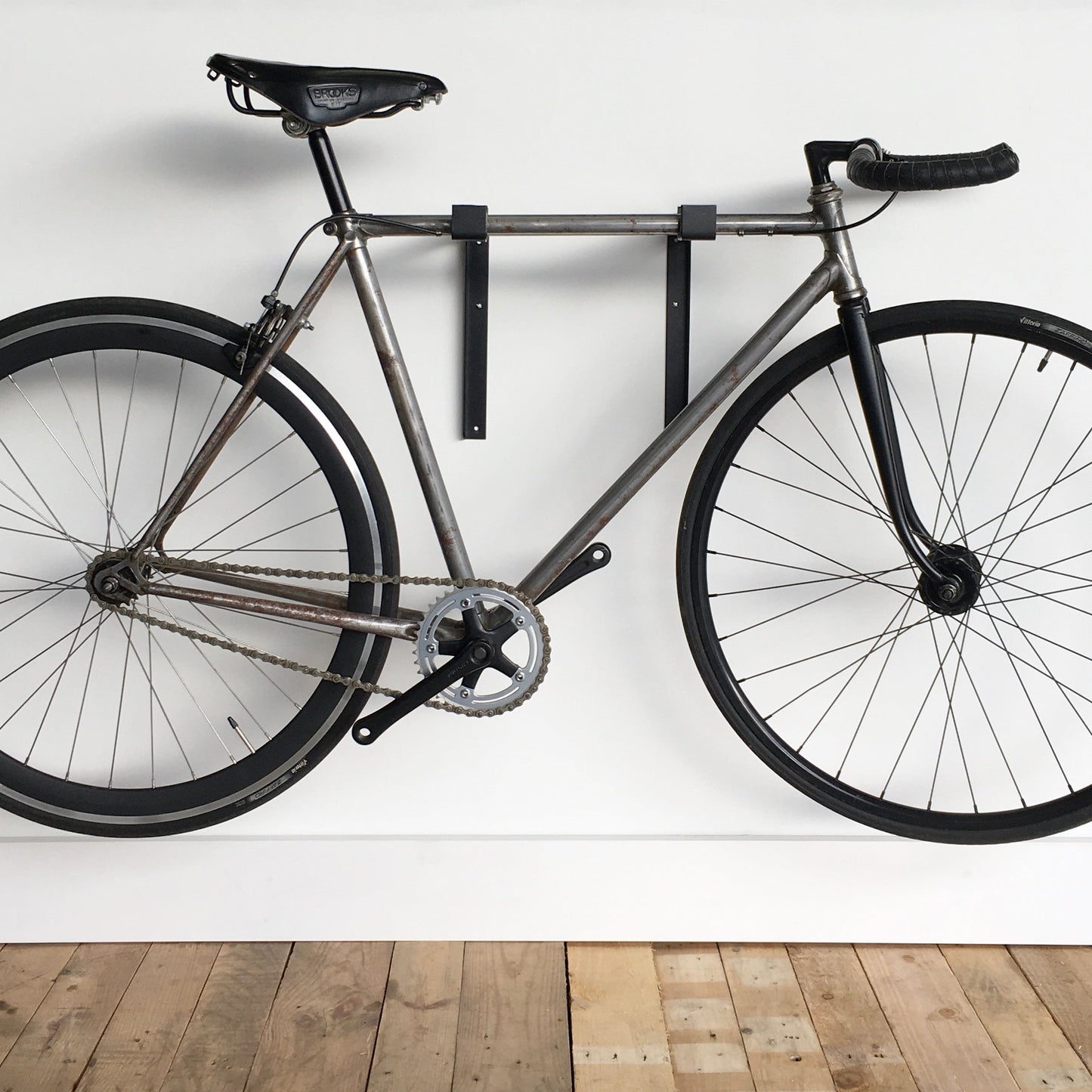 cycle wall hanger | black minimalist + oak shelf